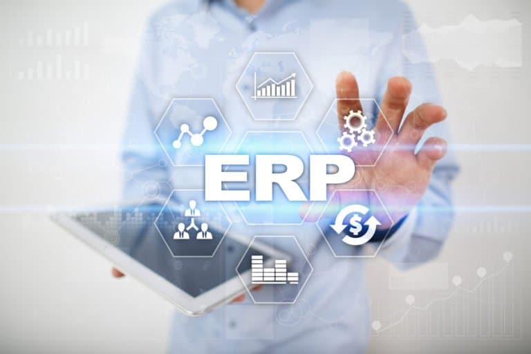 A man holding a tablet with the word erp on it.